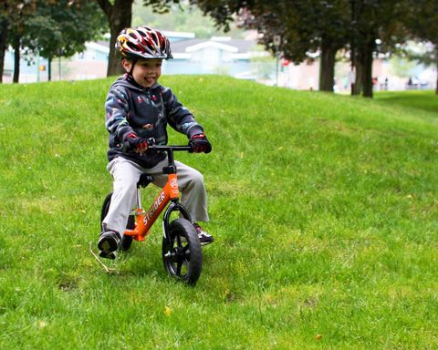 Boy going downhill on Strider Prebike